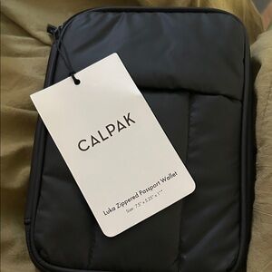 Calpak Black Zippered Passport Wallet